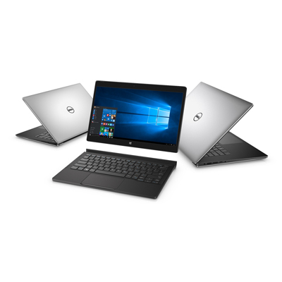 Three Dell XPS notebook computers arranged in a semi-circle. An XPS 13 (Model 9350, Dino 2 XPS) is on the far left, open 45 degrees facing back left. An XPS 12 (Model 9250) 2-in-1 (Veneno), is in the middle, with the tablet screen hovering above a keyboard attachment and the XPS 15 (Model 9550, Berlinetta XPS) is on the right, open 45 degrees facing back right.